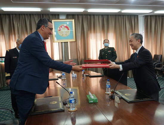 (200417) -- TUNIS, April 17, 2020 -- Chinese Ambassador to Tunisia Wang Wenbin (R) and Tunisian Defense Minister Imed Hazgui sign and exchange handover certificates in Tunis, Tunisia, April 16, 2020. China donated a batch of medical aid to Tunisia s Ministry of National Defense on Thursday. The medical aid includes N95 masks, test kits and medical protective glasses. Hazgui appreciated China for its timely and strong support in the fight against the COVID-19, saying China has set an example for the world to cooperate in fighting the pandemic. He added that Tunisia hopes to learn from China s experience and work with China to overcome the pandemic as soon as possible. TUNISIA-TUNIS-CHINA-MEDICAL AID-COVID-19 HuangxLing 