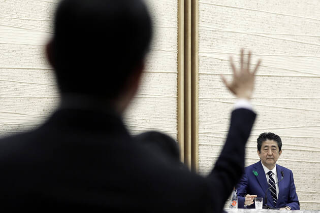 April 17, 2020, Tokyo, Japan: Shinzo Abe, Japan s prime minister, takes a question from a journalist during a news conference at the prime minister s official residence in Tokyo, Japan, on Friday, April 17, 2020. Tokyo Japan - ZUMAz114 20200417_zih_z114_015 Copyright: xPOOLx