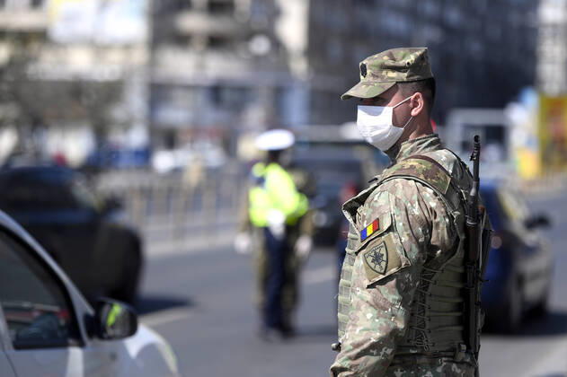 Full lockdown in Bucharest, Romania One romanian armed soldier guards the traffic on a boulevard in Bucharest, Romania, 03 April 2020. Romania s inhabitants are living under a full national lockdown in a bid to slow down the spread of the pandemic COVID-19 disease caused by the SARS-Co-V-2 coronavirus. Romania has confirmed so far 8067 cases of infection with coronavirus SARS-CoV-2 which causes the Covid-19 disease, 400 deaths and 1508 people are reported to be cured and released from hospitals. The Romanian President declared, on 16 March 2020, a state of emergency in the country Credit photo: Alex Nicodim Imago Images Bucharest Romania Copyright: xAlexxNicodimx