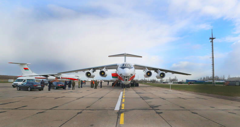 (200417) -- MINSK, April 17, 2020 (Xinhua) -- A military transport plane loaded with Chinese humanitarian aid arrives in Minsk, Belarus, April 17, 2020. A military transport plane loaded with Chinese humanitarian aid arrived here from Beijing on Friday morning. The special flight, arranged by the Belarusian embassy in China, delivered 32 tons of humanitarian goods to Belarus, including rapid test kits, respirators, medical masks, pulse oximeters, medical protective suits, goggles, infrared thermometers and disposable medical gloves. (Photo by Henadz Zhinkov Xinhua) BELARUS-MINSK-CHINA-AID-ARRIVAL