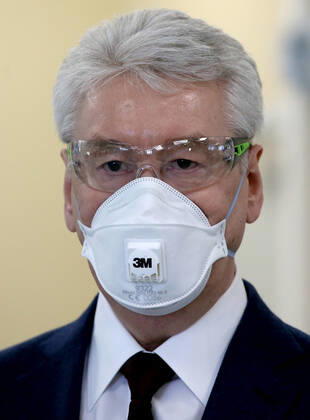 MOSCOW, RUSSIA - APRIL 17, 2020: Moscow Mayor Sergei Sobyanin during the opening of a new infectious diseases hospital for COVID-19 coronavirus patients in the village of Voronovskoye. Vladimir Gerdo TASS  TS0D6230