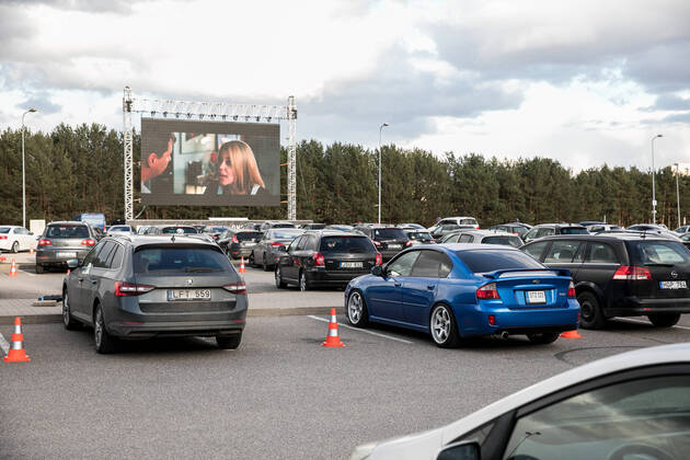 2020-04-17 Vilnius Lithuania. Drive-in cinema opens in Vilnius during quarantine. No more two people allowed in one car, it is forbidden to open car windows. Vilnius Lithuania  Copyright: xJuliusxKalinskasx drive in cinema vilnius auto