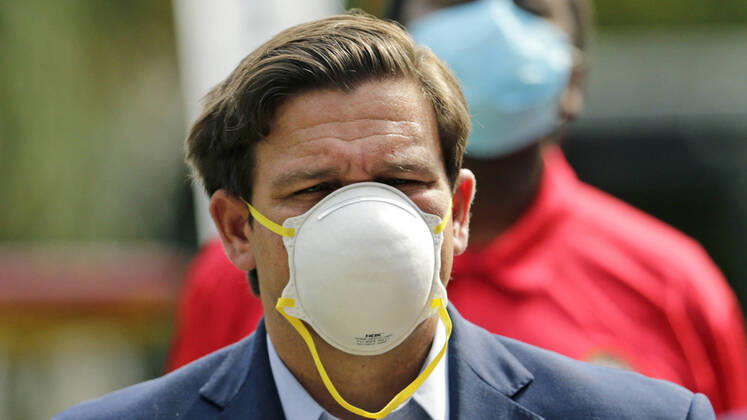 April 17, 2020, Fort Lauderdale, FL, USA: Florida Gov. Ron DeSantis wears a protective mask during a press conference at the Urban League of Broward County to announce that Florida s first two walk-through coronavirus testing sites will be opening in Broward County as the Novel Coronavirus pandemic continues on Friday, April 17, 2020 in Fort Lauderdale, Fla. The sites will open for testing on Saturday and will start with 200 tests per day, Gov. DeSantis said. Fort Lauderdale USA - ZUMAm67_ 20200417_zaf_m67_015 Copyright: xDavidxSantiagox