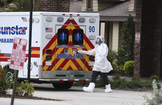 April 17, 2020, Seminole, Florida, USA: Emergency personnel prepare to transport a patient by ambulance from the Freedom Square Seminole Nursing Pavilion, 7800 Liberty Lane, on Friday, April 17, 2020 in Seminole. About 30 patients and staff members at a Pinellas County nursing home have tested positive for the coronavirus, county officials said. Several patients from Freedom Square Seminole Nursing Pavilion have been transferred to local hospitals, Assistant County Administrator Lourdes Benedict told the Tampa Bay Times. Other residents of the facility will be tested, officials said, and the grounds are being cleaned. Seminole USA - ZUMAs70_ 20200417_zan_s70_019 Copyright: xDirkxShaddx