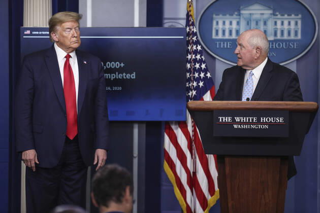 April 17, 2020, Washington, District of Columbia, USA: United States Secretary of Agriculture Sonny Perdue, right, speaks as US President Donald J. Trump, left, looks on during a press briefing with members of the coronavirus task force in the Brady Press Briefing Room of the White House on April 17, 2020 in Washington, DC Washington USA - ZUMAs152 20200417_zaa_s152_048 Copyright: xOliverxContrerasx
