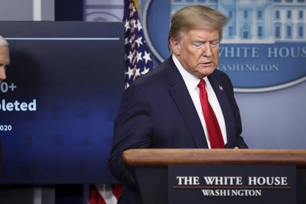 April 17, 2020, Washington, District of Columbia, USA: United States President Donald J. Trump arrives to speak as US Vice President Mike Pence takes his place during a press briefing with members of the coronavirus task force in the Brady Press Briefing Room of the White House on April 17, 2020 in Washington, DC Washington USA - ZUMAs152 20200417_zaa_s152_054 Copyright: xOliverxContrerasx