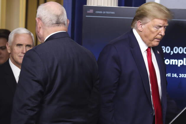 April 17, 2020, Washington, District of Columbia, USA: United States President Donald J. Trump arrives to speak next to US Secretary of Agriculture Sonny Perdue, center, and US Vice President Mike Pence during a press briefing with members of the coronavirus task force in the Brady Press Briefing Room of the White House on April 17, 2020 in Washington, DC Washington USA - ZUMAs152 20200417_zaa_s152_055 Copyright: xOliverxContrerasx