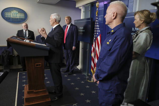 April 17, 2020, Washington, District of Columbia, USA: United States Vice President Mike Pence talks as US President Donald J. Trump, center, listens, during a press briefing with members of the coronavirus task force in the Brady Press Briefing Room of the White House on April 17, 2020 in Washington, DC. From left to right: Director of the Centers for Disease Control and Prevention Dr. Robert Redfield; VP Pence; the President; Admiral Brett Giroir, US Assistant Secretary for Health and Dr. Deborah L. Birx, White House Coronavirus Response Coordinator Washington USA - ZUMAs152 20200417_zaa_s152_067 Copyright: xOliverxContrerasx