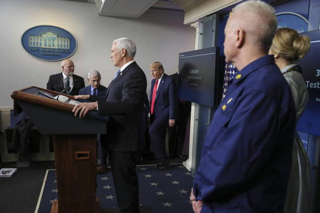 April 17, 2020, Washington, District of Columbia, USA: United States Vice President Mike Pence talks as US President Donald J. Trump returns during a press briefing with members of the coronavirus task force in the Brady Press Briefing Room of the White House on April 17, 2020 in Washington, DC Washington USA - ZUMAs152 20200417_zaa_s152_071 Copyright: xOliverxContrerasx