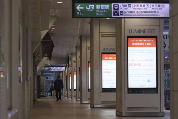 New coronavirus Few people are seen near JR Shinjuku Station in Tokyo on April 18, 2020, during the first weekend under a nationwide state of emergency over the coronavirus pandemic. 