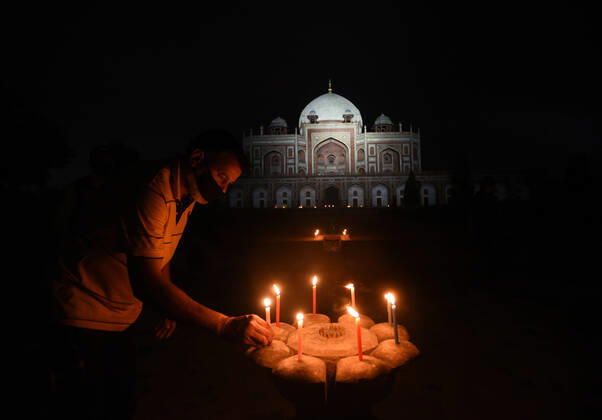 NEW DELHI, INDIA - APRIL 18: Humayun s Tomb seen in the night with candles lit by ASI workers in solidarity with coronavirus frontline personnel on World Heritage Day, on April 18, 2020 in New Delhi, India. ASI Delhi Circle organises diya lighting ceremony at Red Fort and Candle lighting ceremony at Qutub Minar and Humayun s Tomb to express our solidarity with all CORONA WARRIORS like sanitation workers, doctors, police officers and Civil administration. (Photo by Ajay Aggarwal Hindustan Times ) ASI Delhi Circle Oganises Diya Lighting Ceremony In Solidarity With Coronavirus Frontline Personnel On World Heritage Day
