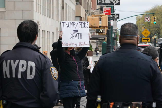 April 18, 2020, New York, NY, USA: Activists with Refuse Fascism deliver body bags props to the Trump International Hotel & Tower New York to protest President TrumpÃ¢â‚¬â ¢s response to COVID-19 on April 18, 2020 in New York. New York USA - ZUMAb148 20200418_zap_b148_131 Copyright: xBryanxSmithx