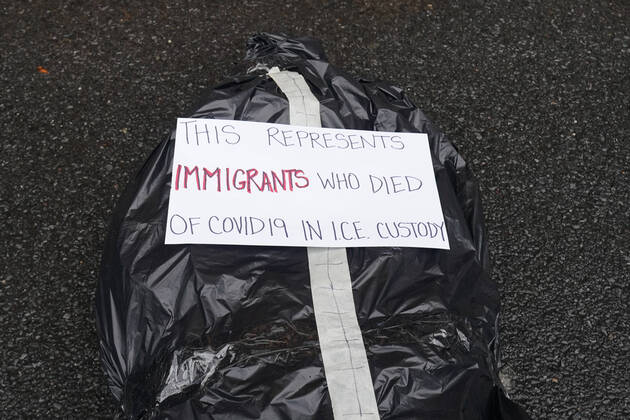 April 18, 2020, New York, NY, USA: Activists with Refuse Fascism deliver body bags props to the Trump International Hotel & Tower New York to protest President TrumpÃ¢â‚¬â ¢s response to COVID-19 on April 18, 2020 in New York. New York USA - ZUMAb148 20200418_zap_b148_144 Copyright: xBryanxSmithx