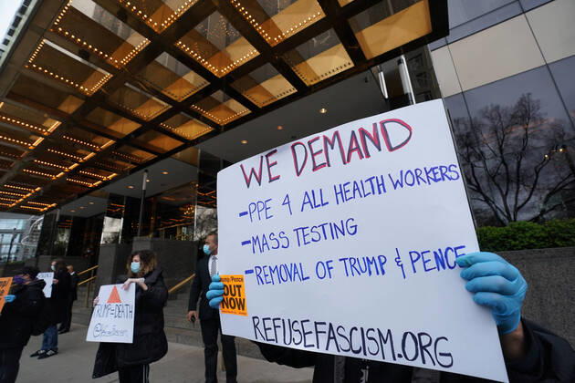 April 18, 2020, New York, NY, USA: Activists with Refuse Fascism deliver body bags props to the Trump International Hotel & Tower New York to protest President TrumpÃ¢â‚¬â ¢s response to COVID-19 on April 18, 2020 in New York. New York USA - ZUMAb148 20200418_zap_b148_168 Copyright: xBryanxSmithx
