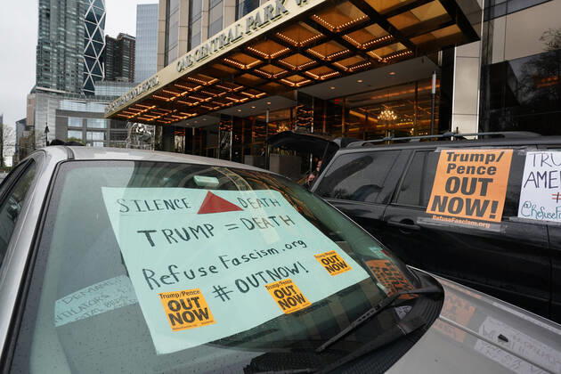 April 18, 2020, New York, NY, USA: Activists with Refuse Fascism deliver body bags props to the Trump International Hotel & Tower New York to protest President TrumpÃ¢â‚¬â ¢s response to COVID-19 on April 18, 2020 in New York. New York USA - ZUMAb148 20200418_zap_b148_169 Copyright: xBryanxSmithx