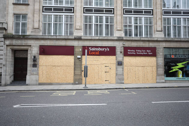 Day Twenty Six of Lockdown in London. A boarded-up Sainsbury s local shop on Ludgate Hill as the country is on lockdown due to the COVID-19 Coronavirus pandemic. People are not allowed to leave home except for minimal food shopping, medical treatment, exercise - once a day, and essential work. COVID-19 Coronavirus lockdown, London, UK, on April 18, 2020 