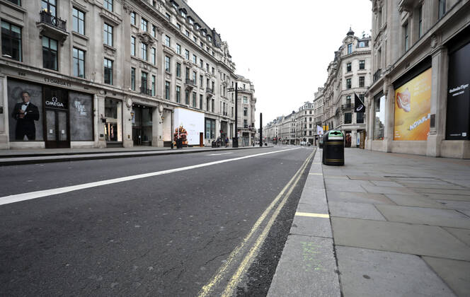 Day Twenty Six of Lockdown in London. Regent Street is deserted at 10.45am on a very quiet central London for a Saturday as the country is on lockdown due to the COVID-19 Coronavirus pandemic. People are not allowed to leave home except for minimal food shopping, medical treatment, exercise - once a day, and essential work. COVID-19 Coronavirus lockdown, London, UK, on April 18, 2020 