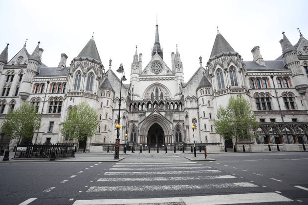 Day Twenty Six of Lockdown in London. The Royal Courts of Justice on a very quiet central London for a Saturday as the country is on lockdown due to the COVID-19 Coronavirus pandemic. People are not allowed to leave home except for minimal food shopping, medical treatment, exercise - once a day, and essential work. COVID-19 Coronavirus lockdown, London, UK, on April 18, 2020 