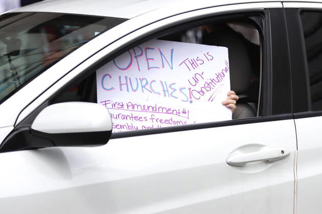 April 18, 2020, San Diego, CA, USA: Protesters in favor of reopening businesses in California came to Broadway in downtown San Diego midday to raise their voices. San Diego USA - ZUMAga3_ 20200418_zap_ga3_013 Copyright: xJohnxGastaldox