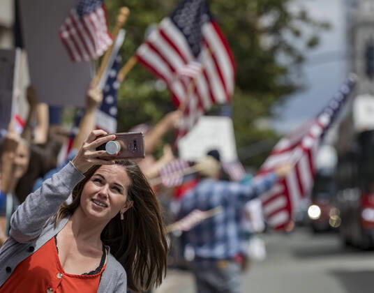 April 18, 2020, San Diego, California, US: Protesters at a Liberate San Diego rally in downtown San Diego on Saturday waved signs and held banners complaining that they wanted the state to lift its stay at home order, a measure meant to reduce the spread of the coronavirus. The event was clearly political, with an overwhelming amount of signs and banners supporting President Trump. San Diego US - ZUMAp23_ 20200418_zaf_p23_028 Copyright: xDavidxPollerx