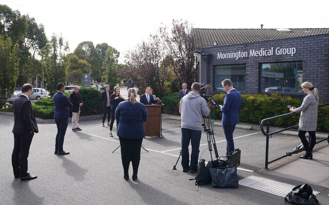 GREG HUNT COVID-19 PRESSER, Australian Health Minister Greg Hunt speaks to the media during a press conference outside of the Mornington Medical Centre in Mornington, Sunday, April 19, 2020. Hunt announced the Australian Government has secured more than three million additional doses of seasonal influenza vaccines and the arrival of 58 million protective face masks that will help provide essential protection for frontline health workers at risk of COVID-19. ( NO ARCHIVING, EDITORIAL USE ONLY, NO USE IN BOOKS WITHOUT CONSENT MELBOURNE VIC AUSTRALIA  Copyright: xSCOTTxBARBOURx 20200419001464192522