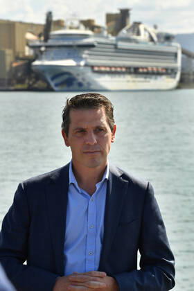 RUBY PRINCESS DEPARTURE, Member for Kiama and NSW Shadow Minister for Health, Ryan Park is seen in front of the Ruby Princess cruiseliner which remains docked at Port Kembla, Wollongong, Sunday, April 19, 2020. A criminal investigation has been launched into how cruise line operator Carnival Australia was allowed to disembark Ruby Princess passengers in Sydney, resulting in several deaths and COVID-19 outbreaks throughout the country. The Ruby Princess was due to depart Port Kembla today. ( NO ARCHIVING, EDITORIAL USE ONLY, NO USE IN BOOKS WITHOUT CONSENT WOLLONGONG NSW AUSTRALIA  Copyright: xDEANxLEWINSx 20200419001464195308