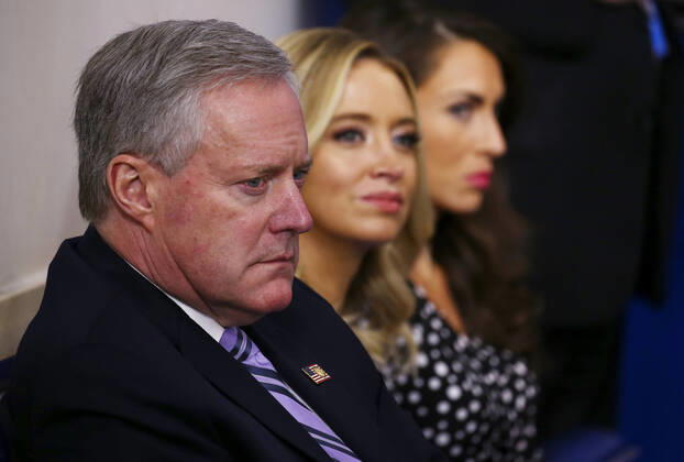 White House Chief of Staff Mark Meadows, left, sits with new Press Secretary Kayleigh McEnany, center, during a briefing on the COVID-19 pandemic at the White House in Washington, D.C. on Saturday, April 18, 2020. Copyright: xTasosxKatopodisx PoolxviaxCNP MediaPunchx