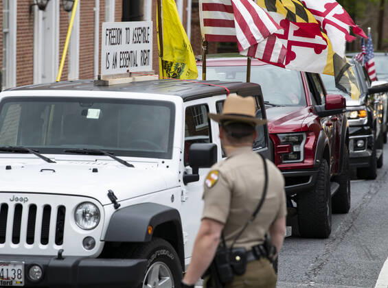 April 18, 2020, Annapolis, Maryland, United State of America: Hundreds of a vehicles gridlock downtown Annapolis, Maryland, April 18th, 2020, in protest of the stay at home order and closing of non-essential businesses by Maryland Governor Larry Hogan. Organizers are urging the governor to reopen businesses, churches and schools, saying there are other ways to social distance without shutting down the economy. ..- Annapolis United State of America - ZUMAa138 20200418_znp_a138_024 Copyright: xPerryxAstonx