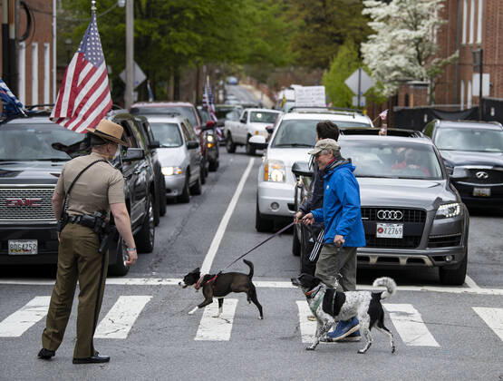 April 18, 2020, Annapolis, Maryland, United State of America: Hundreds of a vehicles gridlock downtown Annapolis, Maryland, April 18th, 2020, in protest of the stay at home order and closing of non-essential businesses by Maryland Governor Larry Hogan. Organizers are urging the governor to reopen businesses, churches and schools, saying there are other ways to social distance without shutting down the economy. ..- Annapolis United State of America - ZUMAa138 20200418_znp_a138_027 Copyright: xPerryxAstonx