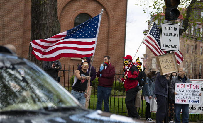 April 18, 2020, Annapolis, Maryland, United State of America: Hundreds of a vehicles gridlock downtown Annapolis, Maryland, April 18th, 2020, in protest of the stay at home order and closing of non-essential businesses by Maryland Governor Larry Hogan. Organizers are urging the governor to reopen businesses, churches and schools, saying there are other ways to social distance without shutting down the economy. ..- Annapolis United State of America - ZUMAa138 20200418_znp_a138_050 Copyright: xPerryxAstonx