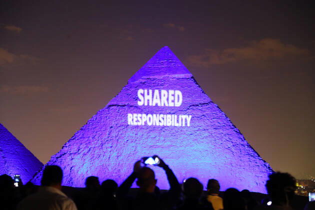 (200418) -- GIZA (EGYPT), April 18, 2020 (Xinhua) -- One of the Giza pyramids is illuminated with words SHARED RESPONSIBILITY during the World Heritage Day amid the COVID-19 pandemic in Giza, Egypt, on April 18, 2020. Egypt reported on Saturday 188 new COVID-19 cases, the highest daily increase, bringing the number of confirmed positive cases in the country to 3,032. (Xinhua Ahmed Gomaa) EGYPT-GIZA-PYRAMIDS-COVID-19-WORLD HERITAGE DAY-ILLUMINATION 