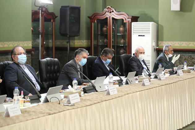April 19, 2020, Tehran, Iran: A handout picture provided by the Iranian presidency on April 19, 2020, shows Iranian cabinet members attending a session chaired by President Hassan Rouhani in the capital Tehran. Iran is going to extend the leave of prisoners temporarily released for one more month, President Rouhani announced Sunday, after the country released 100,000 detainees over the COVID-19 outbreak. Tehran Iran - ZUMAi98_ 20200419_zih_i98_002 Copyright: xIranianxPresidencyx