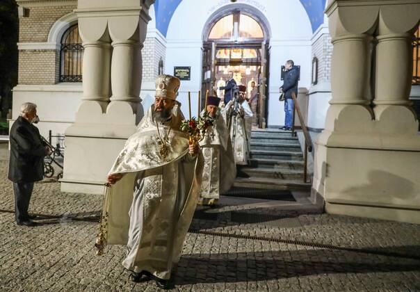 The Autocephalous Orthodox Church did not comply with the restrictions caused by the coronavirus outbreak Procession with the New Flame in the parish of the Saint Jan Klimak Russian Orthodox Church on April 19, 2020 in Warsaw, Poland. Despite the appeal of the Polish state authorities, the Autocephalous Orthodox Church did not comply with restrictions, because it is subject to the Church in Moscow, which allowed masses and processions in Poland and in other countries. EN_01425204_0011 