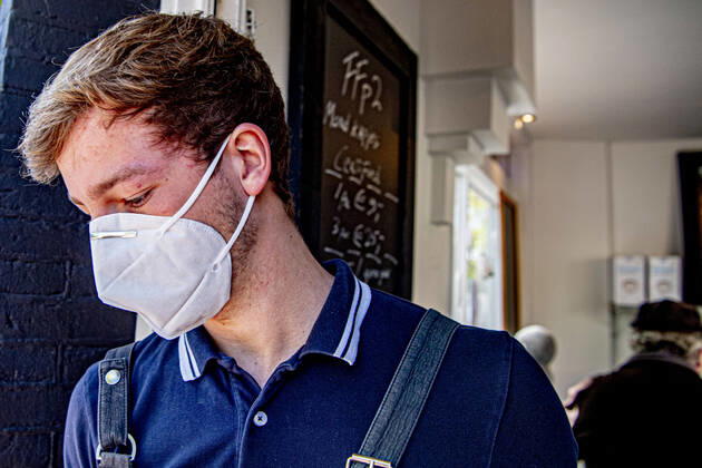 April 19, 2020, Amsterdam, Netherlands: A man wearing a face mask as a protective measure against the spread of Coronavirus at the store..Opening a face mask store during the corona crisis is very critical. Certified surgical face masks would be sold for 9 euros each and the store can only take cash. Amsterdam Netherlands - ZUMAs197 20200419_zaa_s197_039 Copyright: xRobinxUtrechtx