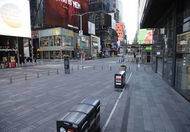 Messages of comfort due to the Coronavirus pandemic dominate the billboards in a nearly empty of pedestrian and automobile traffic Times Square on Easter Sunday of Orthodox Easter weekend in New York City on Sunday, April 19, 2020. The world s Orthodox Christians are celebrating Easter through a series of restrictions and bans including closures of churches due to the Coronavirus pandemic. More than 13,300 people with COVID-19 have died in New York State.  NYP20200419132 JOHNxANGELILLO
