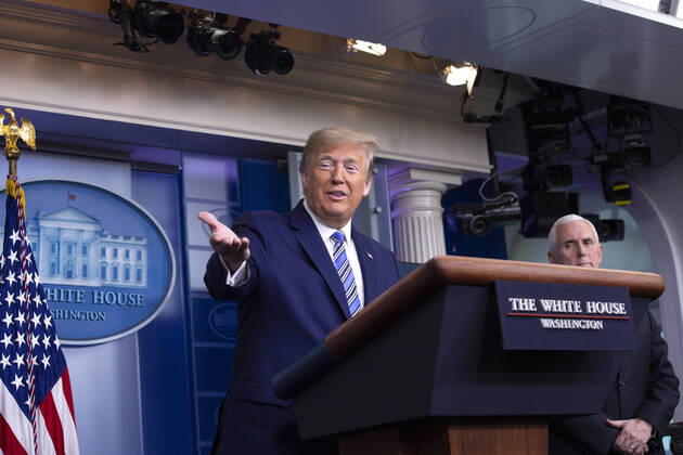 April 19, 2020, Washington, District of Columbia, USA: United States President Donald J. Trump, joined by United States Vice President Mike Pence, delivers remarks on the Coronavirus pandemic during a news conference in the James S. Brady Press Briefing room at the White House in Washington D.C., U.S., on Sunday April 19, 2020. Speaker of the United States House of Representatives Nancy Pelosi (Democrat of California) stated that lawmakers are close to a deal with United States Secretary of the Treasury Steven T. Mnuchin regarding a second round of small business loans for businesses impacted by Coronavirus. Credit: CNP Washington USA - ZUMAs152 20200419_zaa_s152_024 Copyright: xStefanixReynoldsx
