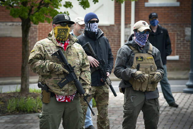 April 19, 2020, Canton, GA: A group of self-described conservative Ã¢â‚¬ËœpatriotsÃ¢â‚¬â ¢ gather outside Cherokee County Courthouse on Sunday April 19 to protest the stateÃ¢â‚¬â ¢s Ã¢â‚¬Ëœshelter in placeÃ¢â‚¬â ¢ orders because of the COVID19 pandemic.Several were armed with AR-15 weapons. Organizers voiced a list of grievances against the state, arguing citizenÃ¢â‚¬â ¢s rights were being violated because of the orders, and vow to ignore state mandate. Canton - ZUMAn03_ 20200419_zaf_n03_017 Copyright: xRobinxRaynex