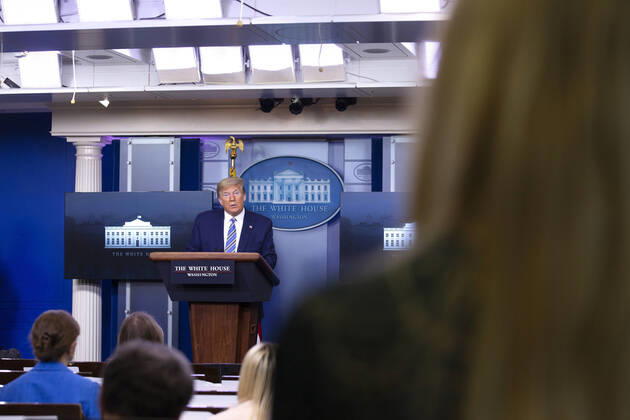 April 19, 2020, Washington, District of Columbia, USA: United States President Donald J. Trump, joined by United States Vice President Mike Pence, takes a question from an OAN (One America News) reporter during a news conference in the James S. Brady Press Briefing room at the White House in Washington D.C., U.S., on Sunday April 19, 2020. Speaker of the United States House of Representatives Nancy Pelosi (Democrat of California) stated that lawmakers are close to a deal with United States Secretary of the Treasury Steven T. Mnuchin regarding a second round of small business loans for businesses impacted by Coronavirus. Credit: CNP Washington USA - ZUMAs152 20200419_zaa_s152_031 Copyright: xStefanixReynoldsx