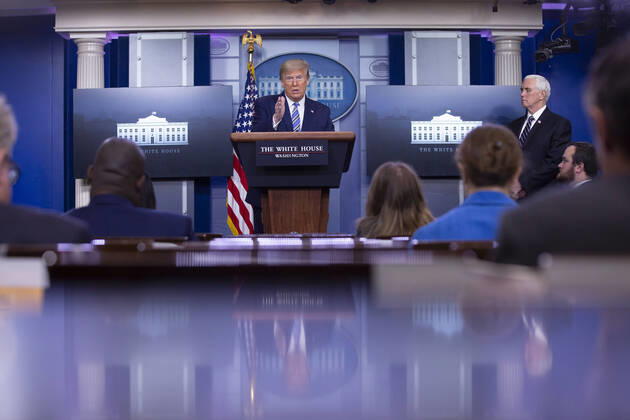 April 19, 2020, Washington, District of Columbia, USA: United States President Donald J. Trump, joined by United States Vice President Mike Pence, delivers remarks on the Coronavirus pandemic during a news conference in the James S. Brady Press Briefing room at the White House in Washington D.C., U.S., on Sunday April 19, 2020. Speaker of the United States House of Representatives Nancy Pelosi (Democrat of California) stated that lawmakers are close to a deal with United States Secretary of the Treasury Steven T. Mnuchin regarding a second round of small business loans for businesses impacted by Coronavirus. Credit: CNP Washington USA - ZUMAs152 20200419_zaa_s152_032 Copyright: xStefanixReynoldsx