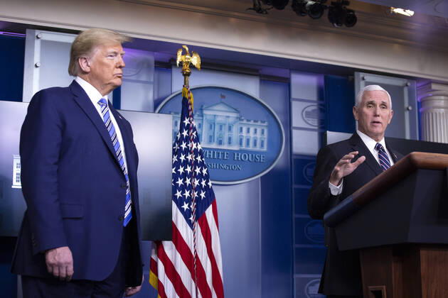 April 19, 2020, Washington, District of Columbia, USA: United States President Donald J. Trump, left, listens as United States Vice President Mike Pence delivers remarks on the Coronavirus pandemic during a news conference in the James S. Brady Press Briefing room at the White House in Washington D.C., U.S., on Sunday April 19, 2020. Speaker of the United States House of Representatives Nancy Pelosi (Democrat of California) stated that lawmakers are close to a deal with United States Secretary of the Treasury Steven T. Mnuchin regarding a second round of small business loans for businesses impacted by Coronavirus. Credit: CNP Washington USA - ZUMAs152 20200419_zaa_s152_033 Copyright: xStefanixReynoldsx