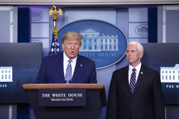 April 19, 2020, Washington, District of Columbia, USA: United States President Donald J. Trump, joined by United States Vice President Mike Pence, delivers remarks on the Coronavirus pandemic during a news conference in the James S. Brady Press Briefing room at the White House in Washington D.C., U.S., on Sunday April 19, 2020. Speaker of the United States House of Representatives Nancy Pelosi (Democrat of California) stated that lawmakers are close to a deal with United States Secretary of the Treasury Steven T. Mnuchin regarding a second round of small business loans for businesses impacted by Coronavirus. Credit: CNP Washington USA - ZUMAs152 20200419_zaa_s152_030 Copyright: xStefanixReynoldsx