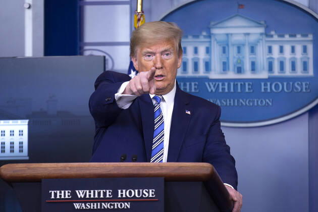 April 19, 2020, Washington, District of Columbia, USA: United States President Donald J. Trump, joined by United States Vice President Mike Pence, delivers remarks on the Coronavirus pandemic during a news conference in the James S. Brady Press Briefing room at the White House in Washington D.C., U.S., on Sunday April 19, 2020. Speaker of the United States House of Representatives Nancy Pelosi (Democrat of California) stated that lawmakers are close to a deal with United States Secretary of the Treasury Steven T. Mnuchin regarding a second round of small business loans for businesses impacted by Coronavirus. Credit: CNP Washington USA - ZUMAs152 20200419_zaa_s152_046 Copyright: xStefanixReynoldsx