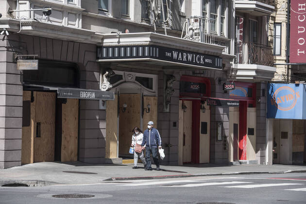 Business are boarded up along Geary Blvd in San Francisco on Sunday, April 19, 2020. San Francisco Mayor London Breed says that efective now, face masks must be worn outside the home to protect against coronavirus.  SXP2020041907 TERRYxSCHMITT