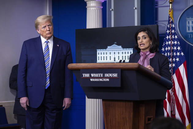 April 19, 2020, Washington, District of Columbia, USA: United States President Donald J. Trump, left, listens as Seema Verma, administrator of the Centers for Medicare and Medicaid Services, delivers remarks on the Coronavirus pandemic during a news conference in the James S. Brady Press Briefing room at the White House in Washington D.C., U.S., on Sunday April 19, 2020. Speaker of the United States House of Representatives Nancy Pelosi (Democrat of California) stated that lawmakers are close to a deal with United States Secretary of the Treasury Steven T. Mnuchin regarding a second round of small business loans for businesses impacted by Coronavirus. Credit: CNP Washington USA - ZUMAs152 20200419_zaa_s152_059 Copyright: xStefanixReynoldsx