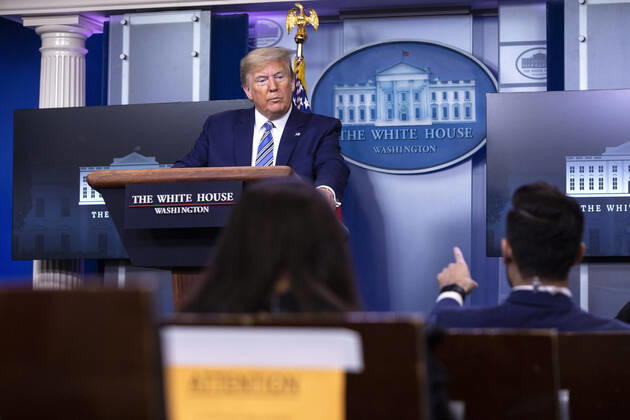April 19, 2020, Washington, District of Columbia, USA: United States President Donald J. Trump, joined by United States Vice President Mike Pence, delivers remarks on the Coronavirus pandemic during a news conference in the James S. Brady Press Briefing room at the White House in Washington D.C., U.S., on Sunday April 19, 2020. Speaker of the United States House of Representatives Nancy Pelosi (Democrat of California) stated that lawmakers are close to a deal with United States Secretary of the Treasury Steven T. Mnuchin regarding a second round of small business loans for businesses impacted by Coronavirus. Credit: CNP Washington USA - ZUMAs152 20200419_zaa_s152_062 Copyright: xStefanixReynoldsx
