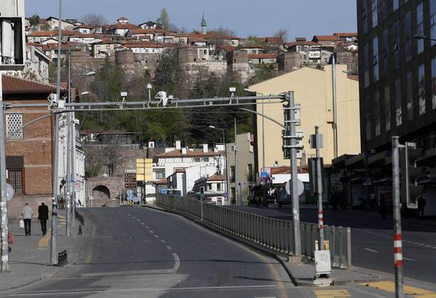 (200419) -- ANKARA, April 19, 2020 (Xinhua) -- Photo taken on April 19, 2020 shows an empty road during a curfew in Ankara, Turkey. Turkish Health Minister Fahrettin Koca on Sunday confirmed 3,977 new COVID-19 cases and 127 more deaths in Turkey. The total number of confirmed COVID-19 cases in Turkey increased to 86,306 while the death toll surged to 2,017, Koca tweeted. (Photo by Mustafa Kaya Xinhua) TURKEY-ANKARA-COVID-19-CURFEW 