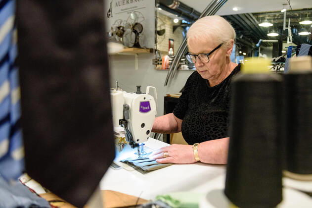 April 20, 2020: Chef Directrice DAGMAR HARTMANN can be seen during the process of making a mask in the manufacture of the Luxury Tie Auerbach in the Hackesche HoÂ¶fe in Berlin Mitte. The company produces mouth-nose-masks made of noble fabrics, partly matching ties or bow ties. - ZUMAs172 20200420_zap_s172_028 Copyright: xJanxScheunertx