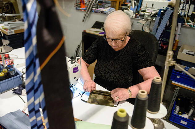 April 20, 2020: Chef Directrice DAGMAR HARTMANN can be seen during the process of making a mask in the manufacture of the Luxury Tie Auerbach in the Hackesche HoÂ¶fe in Berlin Mitte. The company produces mouth-nose-masks made of noble fabrics, partly matching ties or bow ties. - ZUMAs172 20200420_zap_s172_029 Copyright: xJanxScheunertx