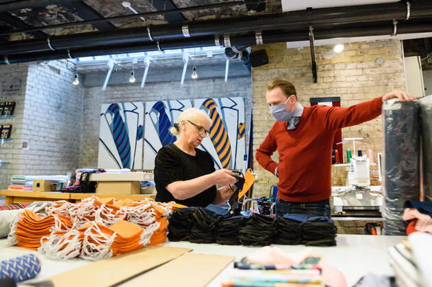 April 20, 2020: Managing Director of the brand Auerbach Berlin GMBH Jan-Henrik SCHEPER-STUKE together with Chef Directrice DAGMAR HARTMANN can be seen during the process of making a mask in the manufacture of the Luxury Tie Auerbach in the Hackesche HoÂ¶fe in Berlin Mitte. The company produces mouth-nose-masks made of noble fabrics, partly matching ties or bow ties. - ZUMAs172 20200420_zap_s172_031 Copyright: xJanxScheunertx