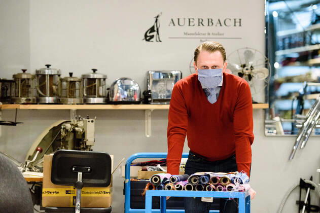 News Bilder des Tages April 20, 2020: Managing Director of the brand Auerbach Berlin GMBH Jan-Henrik SCHEPER-STUKE poses for the photographer in the manufacture of the Luxury Tie Auerbach in the Hackesche HoÂ¶fe in Berlin Mitte. The company produces mouth-nose-masks made of noble fabrics, partly matching ties or bow ties. - ZUMAs172 20200420_zap_s172_033 Copyright: xJanxScheunertx